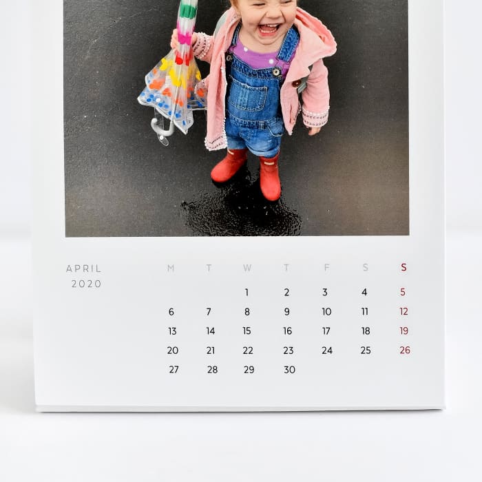 A closeup of the custom photo and dates on a 6x8 inch 14-month Classic Desk Calendar.