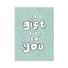 A Gift Just For You Gift Card design, white bubble letters on a green background.