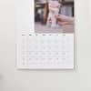 A closeup of an ice cream photo and dates on a 11x17 inch spiral bound Wall Calendar.