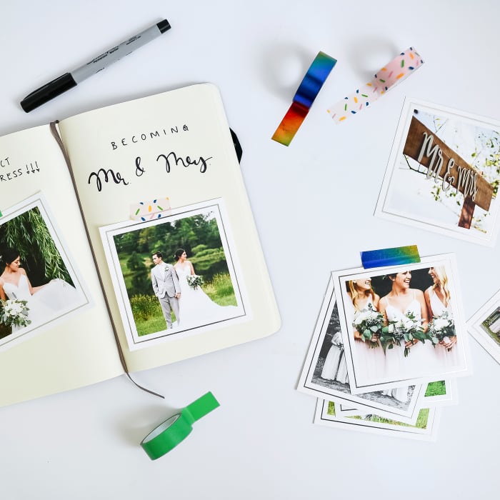 Washi Tape is used to decoratively secure Square Photo Prints into a wedding scrapbook.